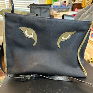 Inoui Editions Normand bag.  In black with leather eyes. Great+ condition.